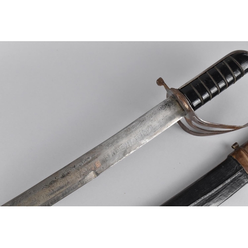 155 - An Indian Curved Blade Sikh Sword with Engraved Blade