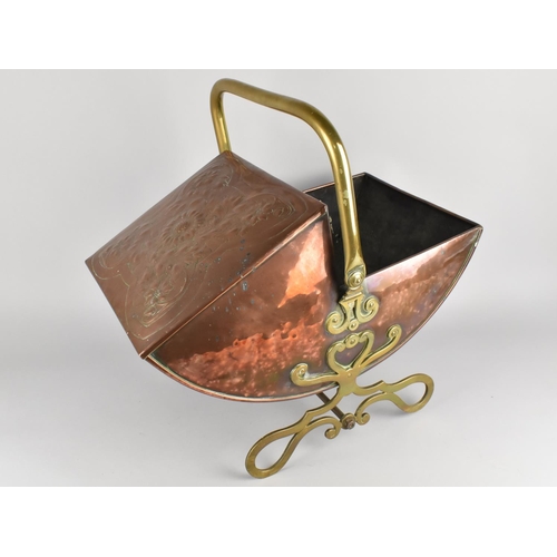 166 - A Copper and Brass Coal Scuttle, 47cms Long