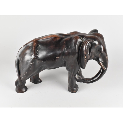 176 - A Bronzed Resin Study of an Elephant, 41cms Long and 27cms High