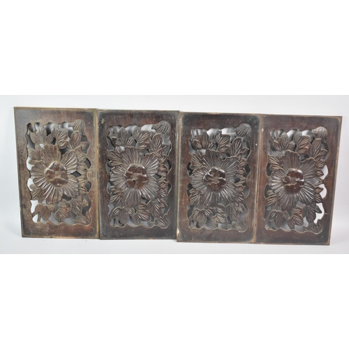 181 - A Set of Four Carved Wooden Panels, Perhaps from Piano or Similar, Each 34x20cms