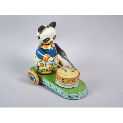 27 - A Vintage Tinplate Clockwork Toy, Drumming Panda, 13cms Long