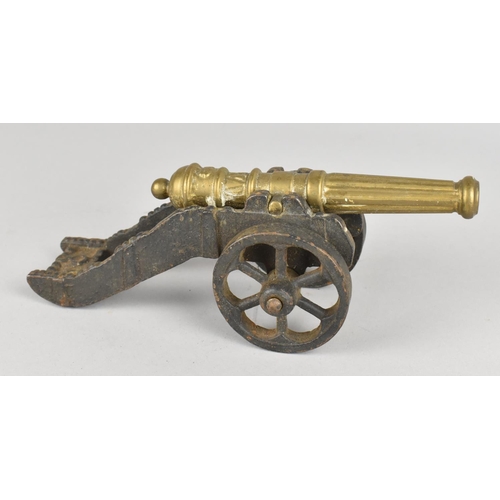 28 - A Cast Iron and Brass Model of a Spanish Cannon, 20cms Long