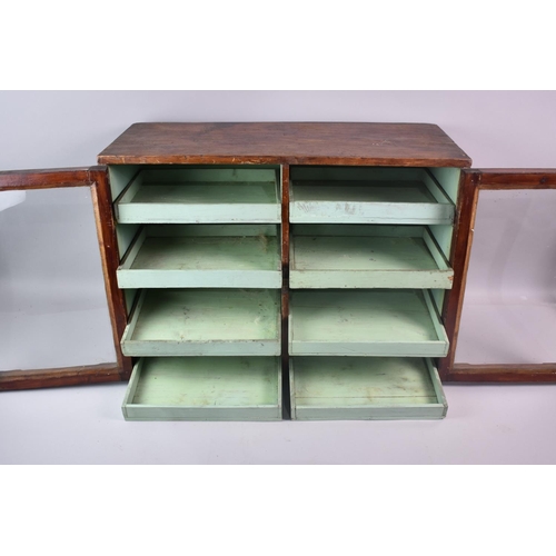 33 - An Edwardian Shop Counter Cabinet with Glazed Doors to Two Section Interior, Each with Four Slides, ... 