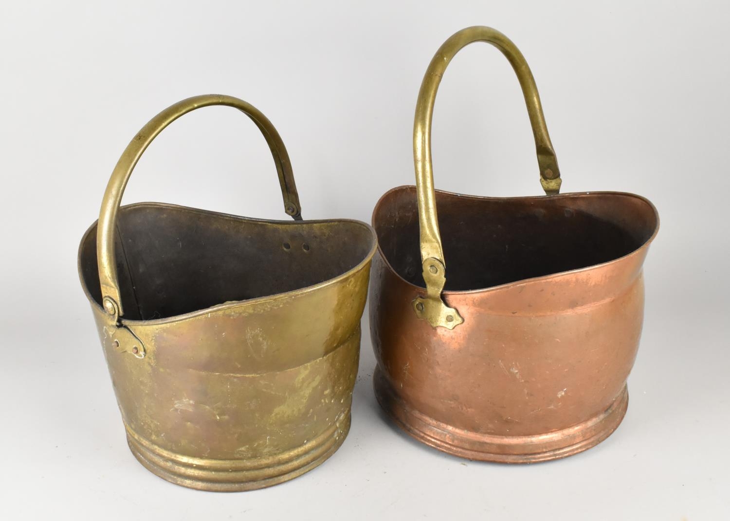 A Copper and Brass Handled Coal Scuttle Together with a Brass Example ...