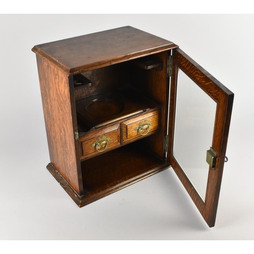 54 - An Edwardian Oak Presentation Smokers Cabinet with Glazed Door to Fitted Interior having Two Centre ... 