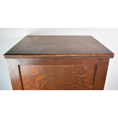 57 - An Edwardian Oak Chest of Three Short Drawers, 34cms Wide and 74cms High, Brass Drop Handles