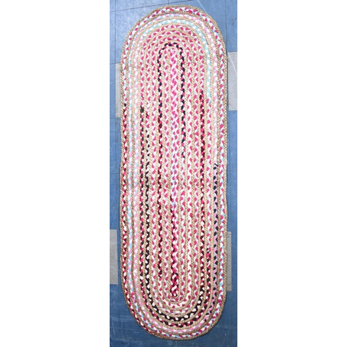 588 - An Indian Cotton and Jute Oval Runner, 180x55cms