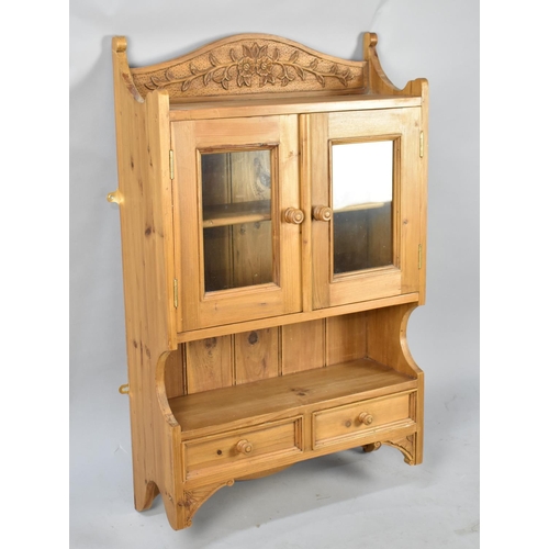 592 - A Late 20th Century Pine Wall Hanging Kitchen Cabinet with Glazed Shelved Top Section and Two Drawer... 