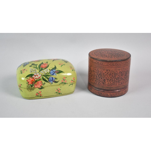 71 - A Cylindrical Kashmiri Box Containing Two Bowls together with a Set of Two Graduated Lacquered Boxes