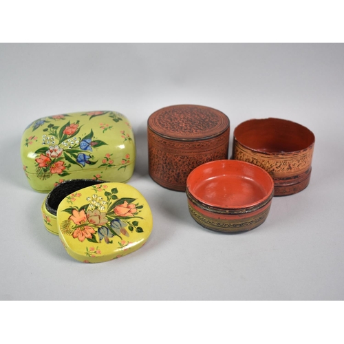 71 - A Cylindrical Kashmiri Box Containing Two Bowls together with a Set of Two Graduated Lacquered Boxes