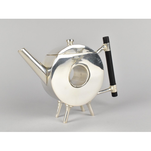 75 - A Reproduction Silver Plated Circular Tea/Coffee Pot in the Manner of Dresser, 15cms High