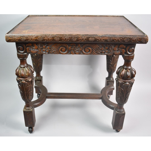 77 - A Carved Oak Occasional Table, 54cms Wide and 52cms High