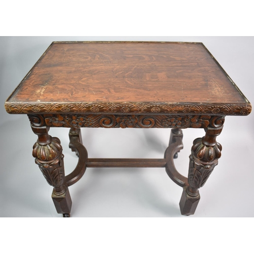 77 - A Carved Oak Occasional Table, 54cms Wide and 52cms High