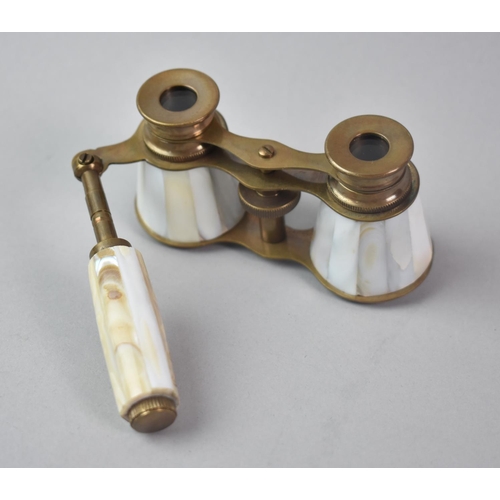 87 - A Reproduction Mother of Pearl Mounted Pair of Brass Opera Glasses with Hinged Handle