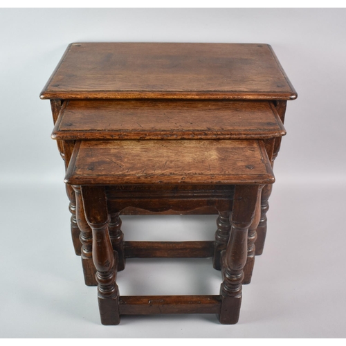 90 - A Nest of Three Mid 20th Century Oak Tables, 49cms Wide