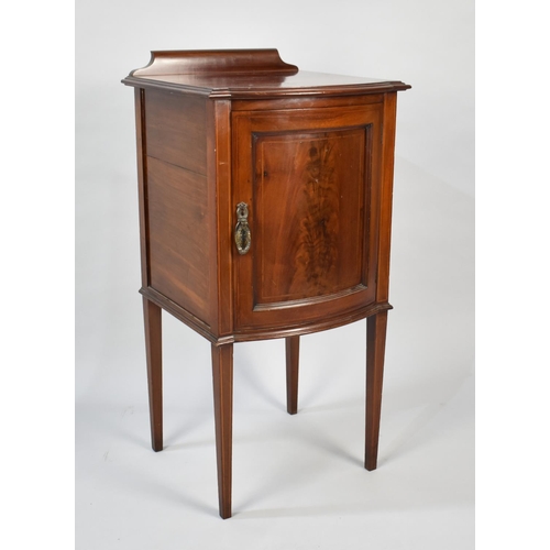 94 - An Edwardian String Inlaid Mahogany Bow Fronted Bedside Cabinet with galleried Back, 41cms Wide and ... 