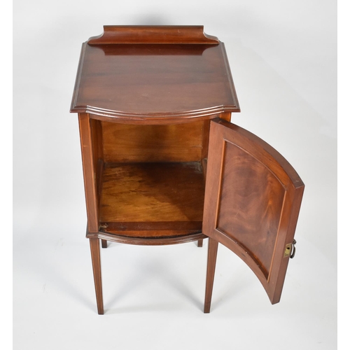 94 - An Edwardian String Inlaid Mahogany Bow Fronted Bedside Cabinet with galleried Back, 41cms Wide and ... 