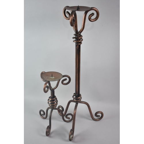 97 - Two Modern Graduated Wrought Iron Candle Pickets on Tripod Stands, 58cms High and 28cms High