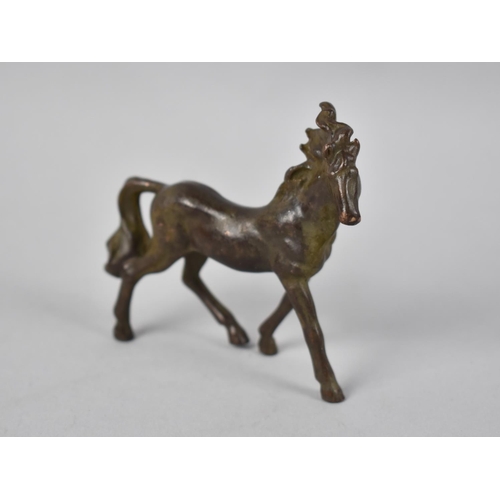 19 - A Patinated Bronze Study of a Trotting Horse, 9cms Long and 8cms High