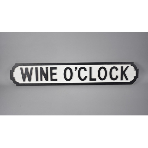 108 - A Modern Painted Wooden Sign in the Form of a Victorian Street Sign 'Wine O'Clock' 78cms by 14cms