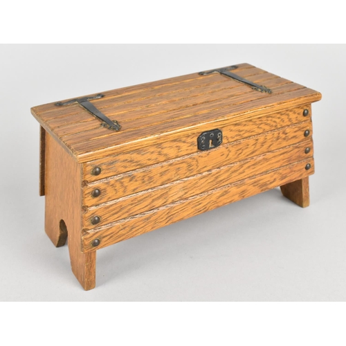 1 - A Continental Novelty Musical Box in the Form of a Plank Top Coffer Chest with Hinged Lid. Playing 