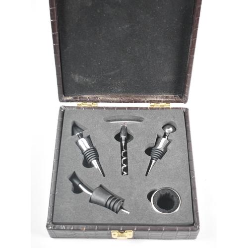 127 - A Modern Cased Wine Set to include Corkscrew, Winesaver Corks, Pourer and Drip Ring