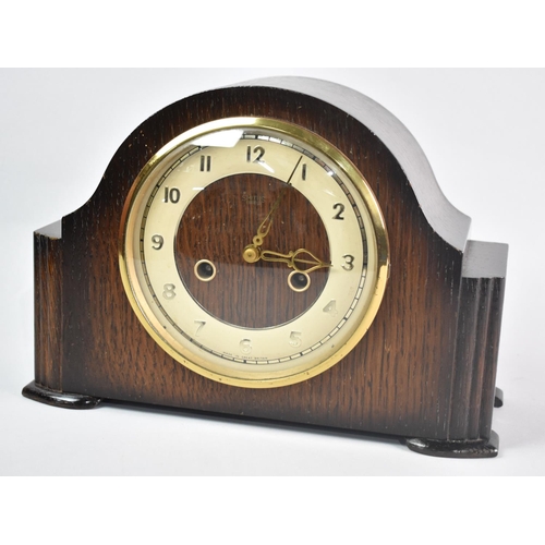 142 - A Mid 20th Century Oak Cased Mantel Clock, 29cms Wide