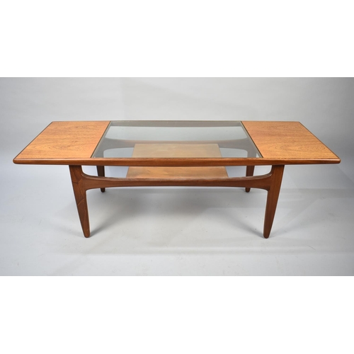 154 - A 1970s G-Plan rectangular Coffee Table with Stretcher Shelf, 137cms Wide