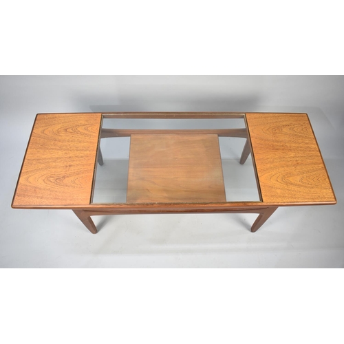 154 - A 1970s G-Plan rectangular Coffee Table with Stretcher Shelf, 137cms Wide