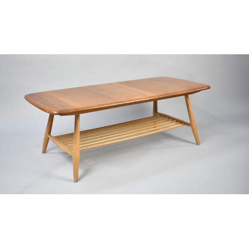 155 - An Ercol Rectangular Coffee Table with Stretcher Shelf, 99cms Long