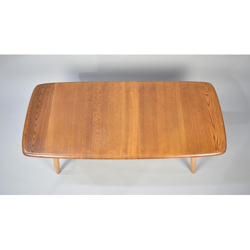 155 - An Ercol Rectangular Coffee Table with Stretcher Shelf, 99cms Long