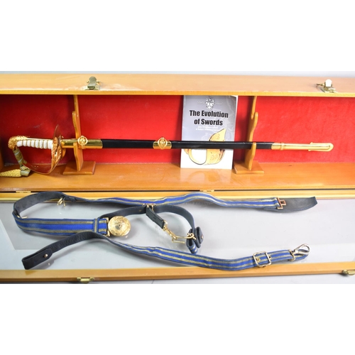 161 - A Modern Cased RAF Dress Sword with Belt and Booklet, The Evolution of Swords, in Presentation Case