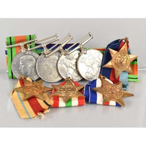 163 - A Collection of Eight WWII Medals to include Italy Star, France and Germany Star, Defence Medal, 39-... 