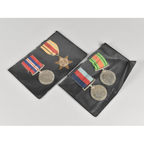 164 - A Collection of Four WWII Medals to include The Africa Star, Defence Medal Etc