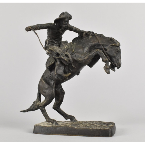 21 - A Franklin Mint Frederick Remington Art Museum Figure, The Broncho Buster, 16cms High