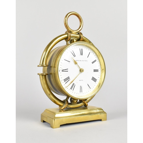 26 - A Brass Cased Drum Clock with White Enamelled Dial Inscribed for Noble and Chivers, Bath, Movement R... 