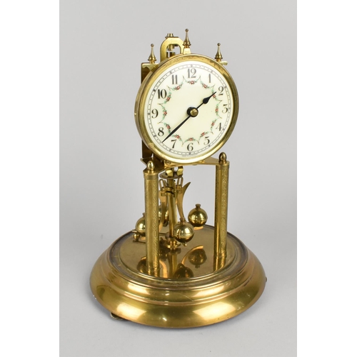 27 - A Mid 20th Century Brass Pillar Clock with Suspension Movement Under Glass Dome, 30cms High