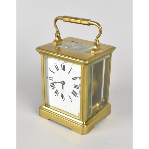 28 - A Mid 20th Century French Brass Cased Carriage Clock with White Enamel Dial, Complete with Key and W... 