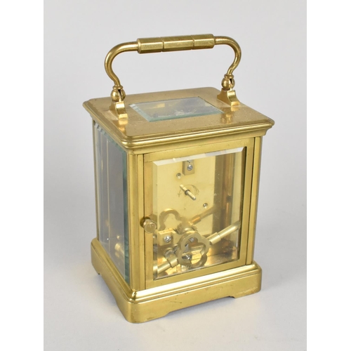 28 - A Mid 20th Century French Brass Cased Carriage Clock with White Enamel Dial, Complete with Key and W... 