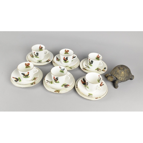 300 - A Poultry Decorated Tea Set Together with a Cast Reconstituted Tortoise