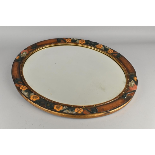 312 - A Carved Wooden and Painted Framed Oval Mirror, 59x49cm