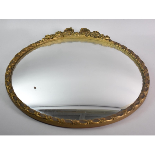 322 - A Gilt Framed Circular Convex Wall Mirror with Bow Finial, 48cm Diameter