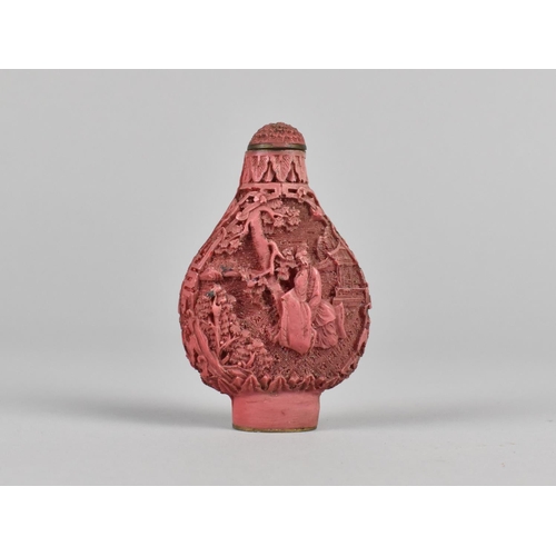 37 - A Cinnabar Style Chinese Snuff Bottle, 7cms High