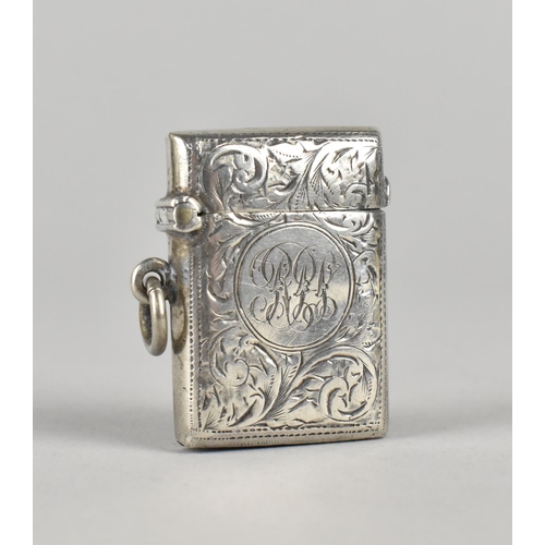 384 - An Edwardian Silver Vesta Case with Scrolled Decoration, Birmingham Hallmark, 17g, 4cm high