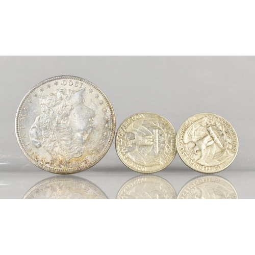 394 - An American One Dollar, 1900 Together with Two Quarter Dollars