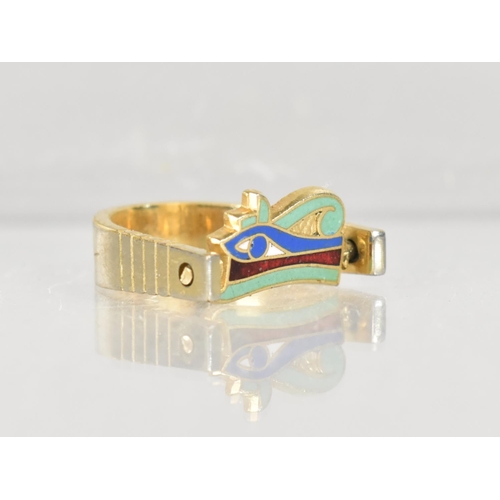 409 - An Egyptian Spinning 'Eye of Horus' Ring, decorated with Turquoise, Carnelian and Lapis Lazuli Colou... 