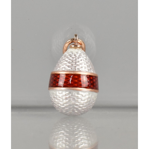 412 - A Russian 14ct and Enamel Egg Pendant