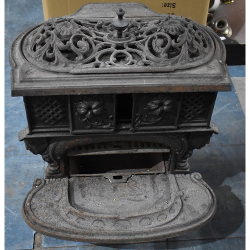 415 - A Small Ornate Victorian Cast Iron Stove