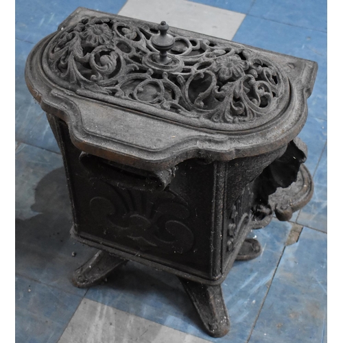 415 - A Small Ornate Victorian Cast Iron Stove