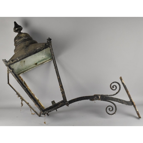 418 - A Victorian Metal Wall Lantern, 79cm high (Weathered Condition and No Glass Panels)